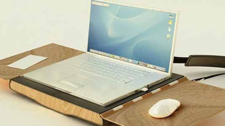 Bu laptop çantası hem sandalye hem masa!